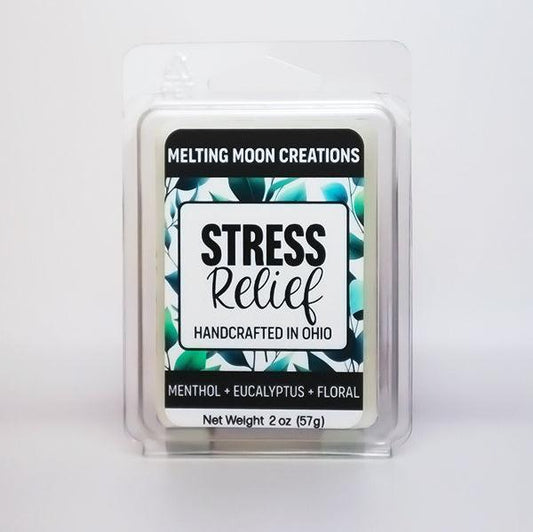 Stress Relief wax melt sitting on white backdrop. Label designed by Melting Moon Creations.