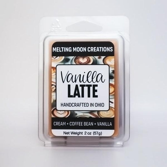 Vanilla Latte wax melt sitting on a white backdrop. Labeled by Melting Moon Creations.